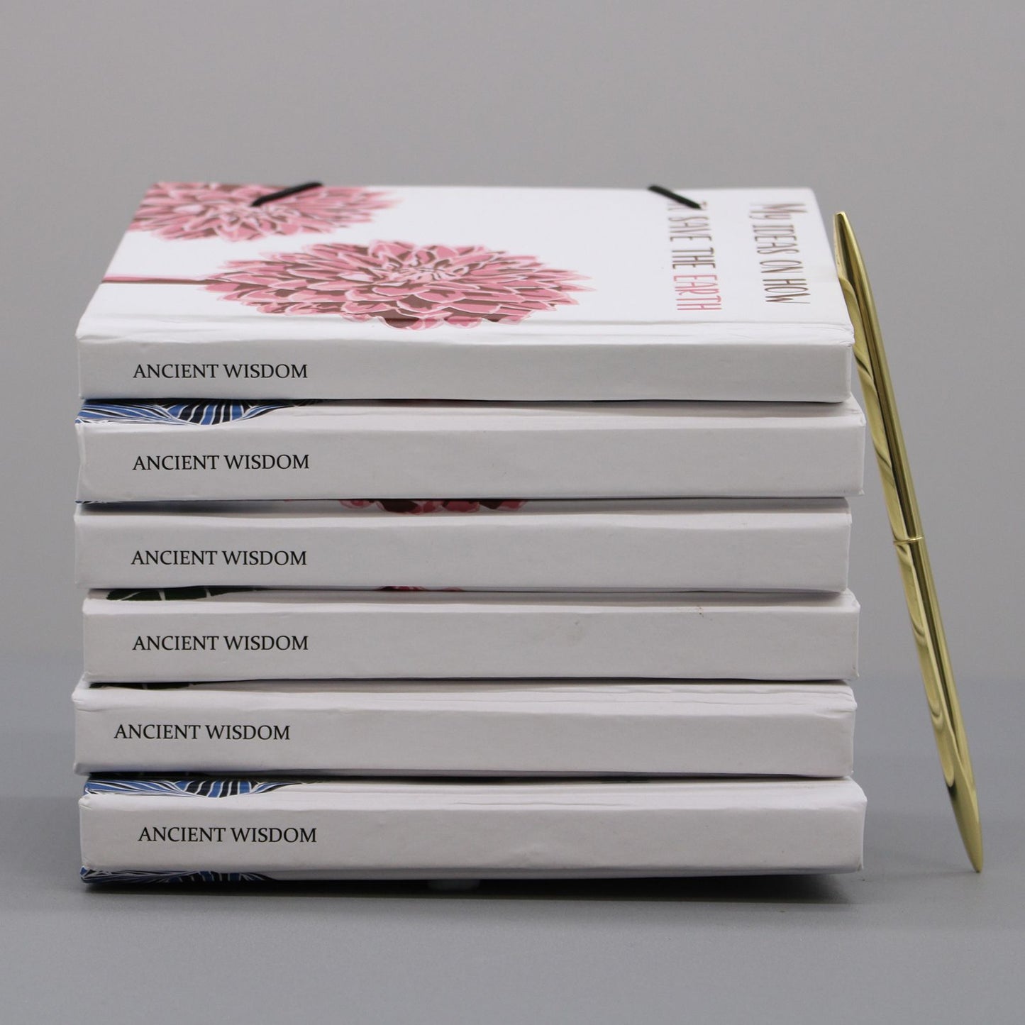 Small Notebook with Strap – We Are Flowers in the Same Garden